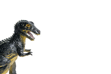 toy dinosaur breaks into a frame on a white background