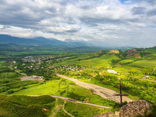 Green Valley and small village at the bank of Ksani River in Georgia