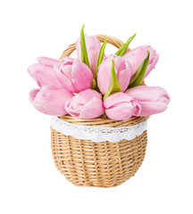 Fototapeta premium Pink tulips flowers in wattled basket