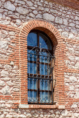 Fototapeta na wymiar Perspective shoot of old masonry stone of window traditional turkish house
