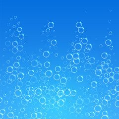 blue water background with bubbles floating upwards