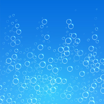 blue water background with bubbles floating upwards