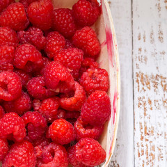 Red raspberries in a basket. Berries, summer and vitamins