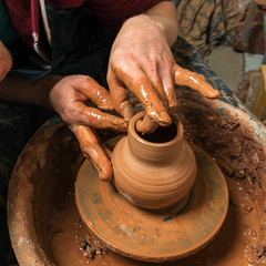 Potter at work. Workshop.