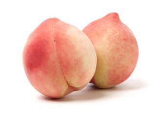 ripe peach on white background 