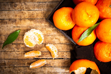 Bunch oranges on a wooden table