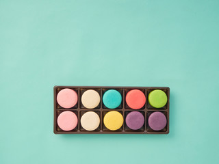 Macarons pattern on pastel blue background