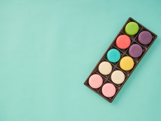 Macarons pattern on pastel blue background