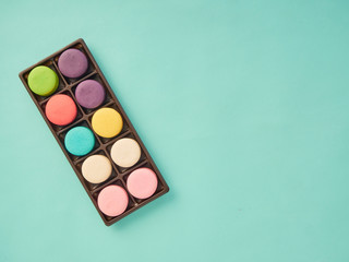 Macarons pattern on pastel blue background