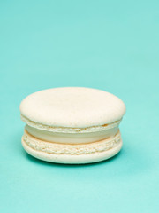 Colorful macarons on a blue background