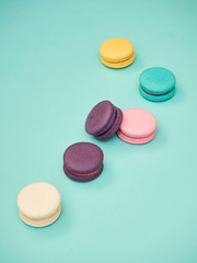 Macarons pattern on pastel blue background