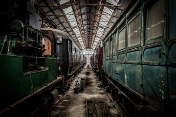 Fototapeta na wymiar Vintage railway engines and cartridges in a shed