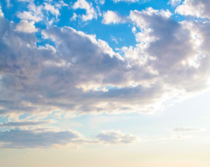 Blue sky clouds background. Beautiful landscape with clouds and sun