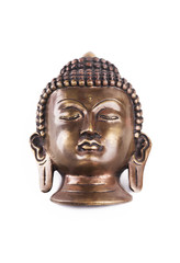 Old Buddha mask made of metal