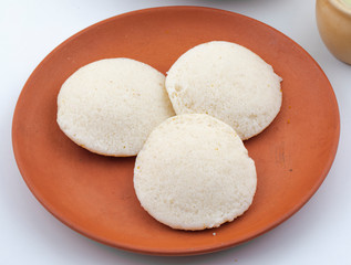 Fototapeta na wymiar South Indian Popular Breakfast Idli or Idly Served With Sambar And Coconut Chutney