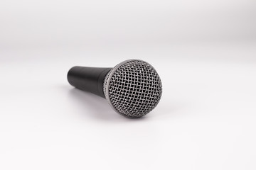 Black and white microphone on a white background.