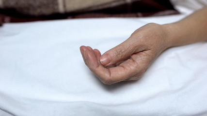 Hand of elderly woman close up, rehabilitation after operation, recovery
