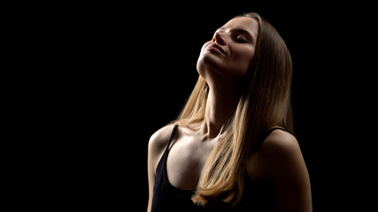 Naklejka premium Woman smiling and deeply breathing, enjoying freedom, fight against insecurities