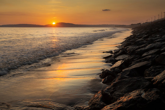 Sunset at Aberavon beach in Port Talbot, South Wales, UK