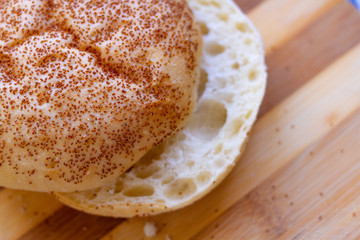 Close up of a Crystal bread bun with sesame seeds. Hamburger bread. Fast Food