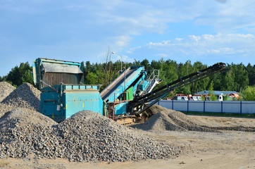 Concrete recycling shredding machine. Modern building techniques concrete processing, crusher and...