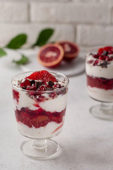 fruit dessert with bloody oranges chia yogurt in a cup