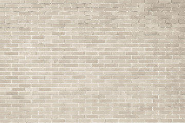Brick wall texture pattern background in natural light ancient cream beige brown color