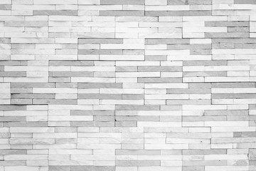 Brick tile wall texture pattern background in white grey color tone