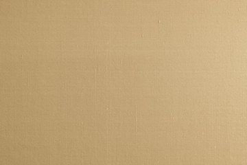 Cotton silk fabric wallpaper texture pattern background in light yellow gold beige brown