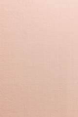 Fototapeta premium Silk cotton linen blended fabrics textile textured background in light pink orange cream beige color