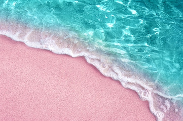 tropical pink sandy beach and clear turquoise water