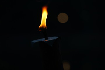 burning fire torch on black background