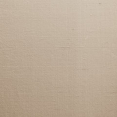 Fototapeta premium Sepia brown silk fabric wallpaper texture pattern background in light pale yellow cream beige color tone