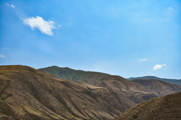 landscape with mountains and blue sky