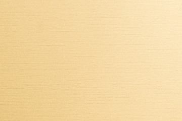 Gold cotton silk fabric wallpaper texture pattern background in light gold beige brown color