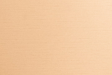 Fototapeta premium Blended cotton silk fabric textile wallpaper texture pattern background in light orange beige brown pastel color