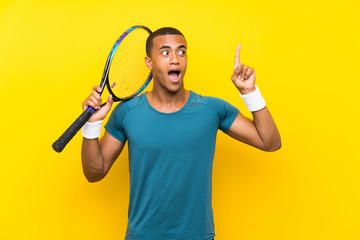 African American tennis player man intending to realizes the solution while lifting a finger up