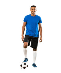 Full-length shot of African American football player man over isolated white background