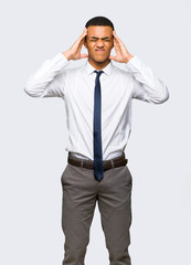 Young afro american businessman unhappy and frustrated with something on isolated background