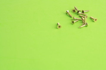golden star screws, in colorful background