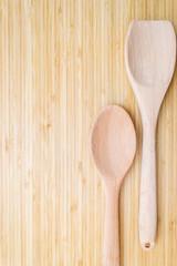 Kitchen utensils on wooden board