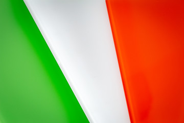 colored glass, pieces, orange, white, green like the flag of Ireland