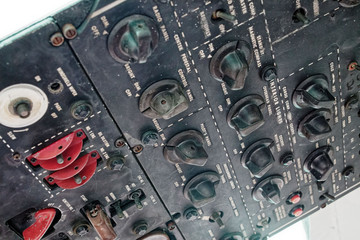 old vintage aircraft cockpit detail, pattern of multi meter gauge measure background