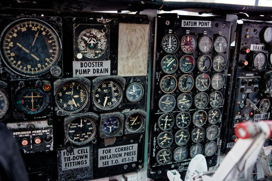 old vintage aircraft cockpit detail, pattern of multi meter gauge measure background