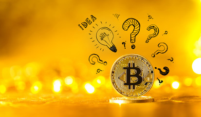 Idea light bulbs with question marks with gold bitcoin cryptocurrency coin