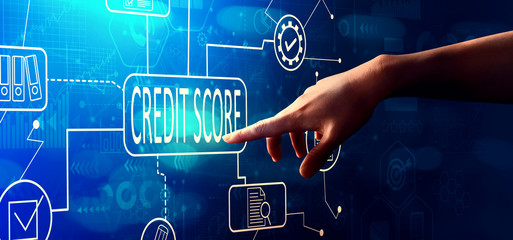 Credit score theme with hand pressing a button on a technology screen