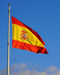 View of the yellow and red Flag of Spain (Bandera de España) floating in the wind