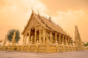 The golden temple is a landmark of Chachoengsao province,Thailand. Wat Pak Num Jolo temple with...