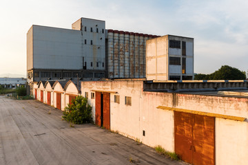 Fototapeta na wymiar Urban exploration in an abandoned agroindustrial factory
