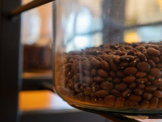 Dried black beans sitting in glass jar preserved